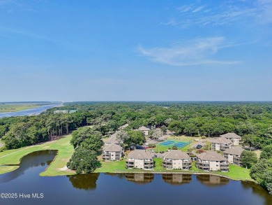 Expansive golf and water views abound in this spacious condo on Oyster Bay Golf Links in North Carolina - for sale on GolfHomes.com, golf home, golf lot