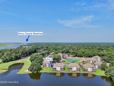 Expansive golf and water views abound in this spacious condo on Oyster Bay Golf Links in North Carolina - for sale on GolfHomes.com, golf home, golf lot