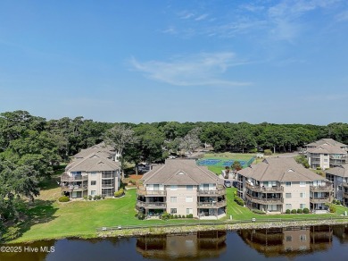 Expansive golf and water views abound in this spacious condo on Oyster Bay Golf Links in North Carolina - for sale on GolfHomes.com, golf home, golf lot