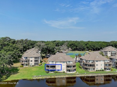 Expansive golf and water views abound in this spacious condo on Oyster Bay Golf Links in North Carolina - for sale on GolfHomes.com, golf home, golf lot
