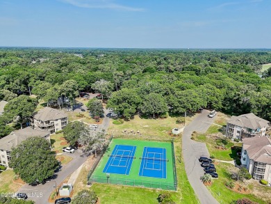 Expansive golf and water views abound in this spacious condo on Oyster Bay Golf Links in North Carolina - for sale on GolfHomes.com, golf home, golf lot