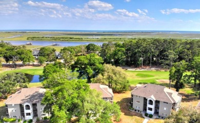 Expansive golf and water views abound in this spacious condo on Oyster Bay Golf Links in North Carolina - for sale on GolfHomes.com, golf home, golf lot