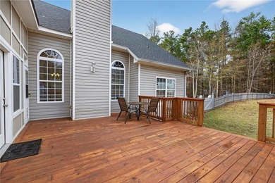 Tucked inside the gated, resort-style community of Fairfield on Fairfield Plantation Golf and Country Club in Georgia - for sale on GolfHomes.com, golf home, golf lot