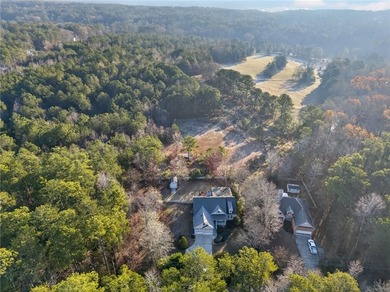 Tucked inside the gated, resort-style community of Fairfield on Fairfield Plantation Golf and Country Club in Georgia - for sale on GolfHomes.com, golf home, golf lot