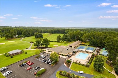 Tucked inside the gated, resort-style community of Fairfield on Fairfield Plantation Golf and Country Club in Georgia - for sale on GolfHomes.com, golf home, golf lot