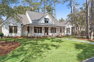 Thoughtfully designed and expertly crafted by Davenport Homes on The King and Prince Golf Course, Home of the Hampton Club in Georgia - for sale on GolfHomes.com, golf home, golf lot