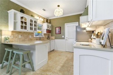 Charming Cape Cod-style cottage on a beautiful corner lot in a on Sea Island Golf Club in Georgia - for sale on GolfHomes.com, golf home, golf lot