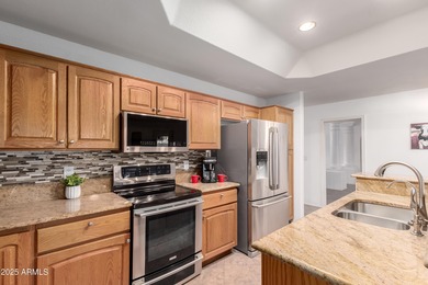 This move in ready home is situated on a Premium Golf Course Lot on Sunland Springs Golf Course  in Arizona - for sale on GolfHomes.com, golf home, golf lot