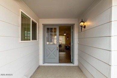 Step through the double entry doors into a comfortable on Ahwatukee Country Club in Arizona - for sale on GolfHomes.com, golf home, golf lot
