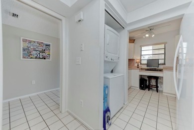 Rare First-Floor 3-Bedroom Corner Condo with Golf Course Views - on University Park Country Club in Florida - for sale on GolfHomes.com, golf home, golf lot