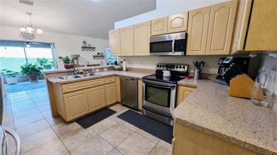 This inviting 3-bedroom, 2-bathroom home offers 1,648 square on Citrus Springs Country Club in Florida - for sale on GolfHomes.com, golf home, golf lot