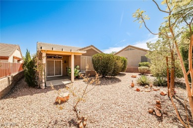 Nestled on a peaceful cul-de-sac in Sun City MacDonald Ranch 55+ on Desert Willow Golf Course in Nevada - for sale on GolfHomes.com, golf home, golf lot