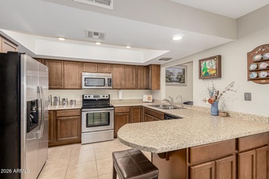 Step through the double entry doors into a comfortable on Ahwatukee Country Club in Arizona - for sale on GolfHomes.com, golf home, golf lot