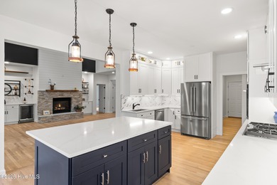 Prepared to be wowed by this custom William Poole designed home on Members Club At St. James Plantation in North Carolina - for sale on GolfHomes.com, golf home, golf lot