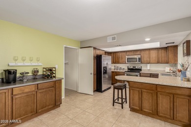 Step through the double entry doors into a comfortable on Ahwatukee Country Club in Arizona - for sale on GolfHomes.com, golf home, golf lot