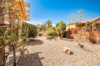 Nestled on a peaceful cul-de-sac in Sun City MacDonald Ranch 55+ on Desert Willow Golf Course in Nevada - for sale on GolfHomes.com, golf home, golf lot
