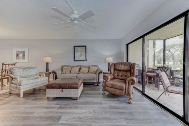 Rare First-Floor 3-Bedroom Corner Condo with Golf Course Views - on University Park Country Club in Florida - for sale on GolfHomes.com, golf home, golf lot