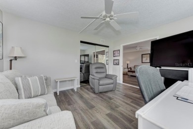 Rare First-Floor 3-Bedroom Corner Condo with Golf Course Views - on University Park Country Club in Florida - for sale on GolfHomes.com, golf home, golf lot