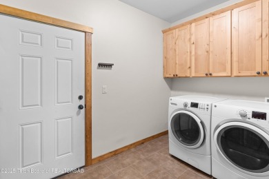 Built in 2017, this meticulously maintained ranch-style home on Star Valley RV Golf Course in Wyoming - for sale on GolfHomes.com, golf home, golf lot
