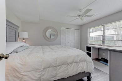Rare First-Floor 3-Bedroom Corner Condo with Golf Course Views - on University Park Country Club in Florida - for sale on GolfHomes.com, golf home, golf lot