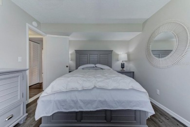 Rare First-Floor 3-Bedroom Corner Condo with Golf Course Views - on University Park Country Club in Florida - for sale on GolfHomes.com, golf home, golf lot