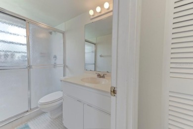 Rare First-Floor 3-Bedroom Corner Condo with Golf Course Views - on University Park Country Club in Florida - for sale on GolfHomes.com, golf home, golf lot