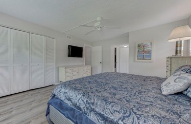 Rare First-Floor 3-Bedroom Corner Condo with Golf Course Views - on University Park Country Club in Florida - for sale on GolfHomes.com, golf home, golf lot