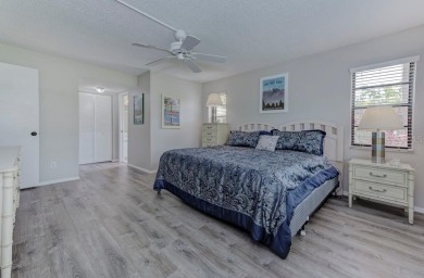 Rare First-Floor 3-Bedroom Corner Condo with Golf Course Views - on University Park Country Club in Florida - for sale on GolfHomes.com, golf home, golf lot