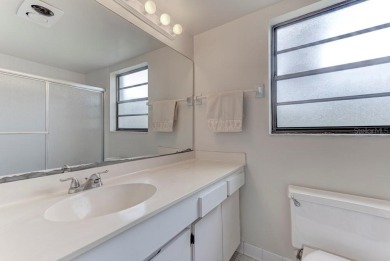 Rare First-Floor 3-Bedroom Corner Condo with Golf Course Views - on University Park Country Club in Florida - for sale on GolfHomes.com, golf home, golf lot