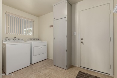 Step through double entry doors into an easy-living home in a on Ahwatukee Country Club in Arizona - for sale on GolfHomes.com, golf home, golf lot