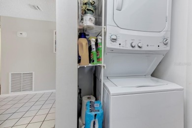Rare First-Floor 3-Bedroom Corner Condo with Golf Course Views - on University Park Country Club in Florida - for sale on GolfHomes.com, golf home, golf lot