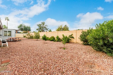 Step through double entry doors into an easy-living home in a on Ahwatukee Country Club in Arizona - for sale on GolfHomes.com, golf home, golf lot
