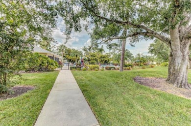 Rare First-Floor 3-Bedroom Corner Condo with Golf Course Views - on University Park Country Club in Florida - for sale on GolfHomes.com, golf home, golf lot