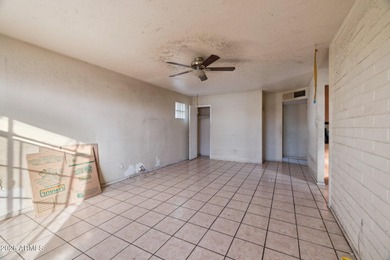 Incredible fix up opportunity! This home is being offered as-is on Maryvale Golf Course in Arizona - for sale on GolfHomes.com, golf home, golf lot