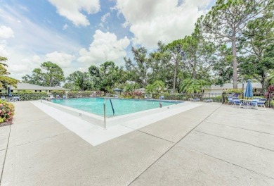Rare First-Floor 3-Bedroom Corner Condo with Golf Course Views - on University Park Country Club in Florida - for sale on GolfHomes.com, golf home, golf lot