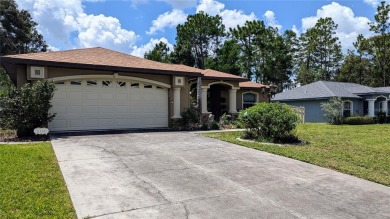 This inviting 3-bedroom, 2-bathroom home offers 1,648 square on Citrus Springs Country Club in Florida - for sale on GolfHomes.com, golf home, golf lot