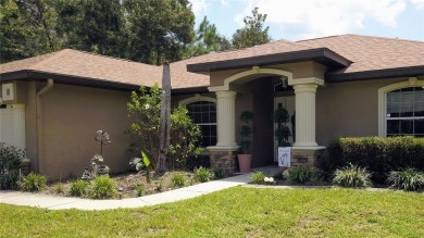 This inviting 3-bedroom, 2-bathroom home offers 1,648 square on Citrus Springs Country Club in Florida - for sale on GolfHomes.com, golf home, golf lot