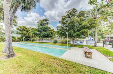Rare First-Floor 3-Bedroom Corner Condo with Golf Course Views - on University Park Country Club in Florida - for sale on GolfHomes.com, golf home, golf lot