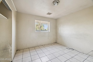 Incredible fix up opportunity! This home is being offered as-is on Maryvale Golf Course in Arizona - for sale on GolfHomes.com, golf home, golf lot