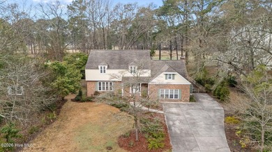 This lovely low-maintenance home features 4 BR, 2.5 baths, large on River Bend Golf and Country Club in North Carolina - for sale on GolfHomes.com, golf home, golf lot
