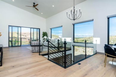Welcome to your dream home! Nestled along the scenic 11th hole on The Golf Club At Redlands Mesa in Colorado - for sale on GolfHomes.com, golf home, golf lot