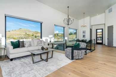 Welcome to your dream home! Nestled along the scenic 11th hole on The Golf Club At Redlands Mesa in Colorado - for sale on GolfHomes.com, golf home, golf lot
