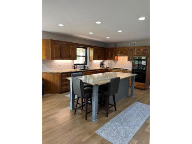 Welcome to your new home in the heart of Leawood! This beautiful on Leawood South Country Club in Kansas - for sale on GolfHomes.com, golf home, golf lot
