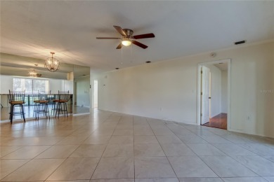 Welcome to El Pasado Condominiums, a quiet, well-maintained on Tarpon Woods Golf Club in Florida - for sale on GolfHomes.com, golf home, golf lot