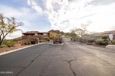 Nestled in a serene, gated community on a near-acre lot on Gold Canyon Golf Resort - Dinosaur Mountain in Arizona - for sale on GolfHomes.com, golf home, golf lot