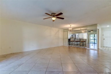 Welcome to El Pasado Condominiums, a quiet, well-maintained on Tarpon Woods Golf Club in Florida - for sale on GolfHomes.com, golf home, golf lot