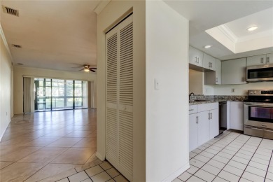 Welcome to El Pasado Condominiums, a quiet, well-maintained on Tarpon Woods Golf Club in Florida - for sale on GolfHomes.com, golf home, golf lot