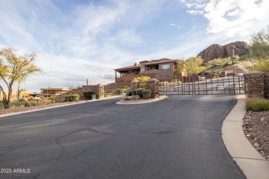 Nestled in a serene, gated community on a near-acre lot on Gold Canyon Golf Resort - Dinosaur Mountain in Arizona - for sale on GolfHomes.com, golf home, golf lot