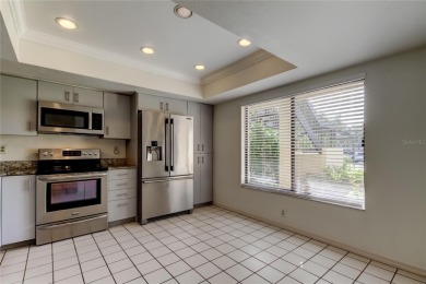 Welcome to El Pasado Condominiums, a quiet, well-maintained on Tarpon Woods Golf Club in Florida - for sale on GolfHomes.com, golf home, golf lot
