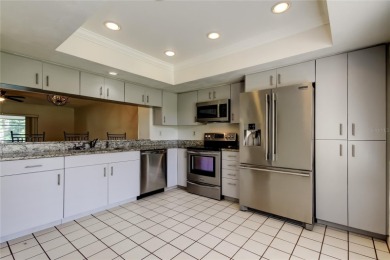 Welcome to El Pasado Condominiums, a quiet, well-maintained on Tarpon Woods Golf Club in Florida - for sale on GolfHomes.com, golf home, golf lot